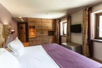 Posteľ alebo postele v izbe v ubytovaní Chalet Eden Eco Hotel, Restaurant & Wellness