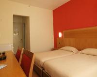 Postel nebo postele na pokoji v ubytování Diana Hotel