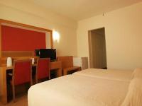 Postel nebo postele na pokoji v ubytování Diana Hotel