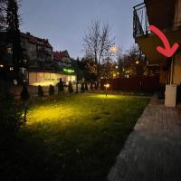 Vonkajšia záhrada v ubytovaní Apartament ONE ogródek i parking