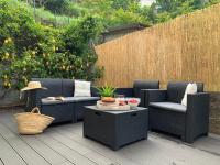 A seating area at "Sunset Garden" apartment