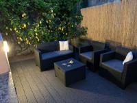 A seating area at "Sunset Garden" apartment