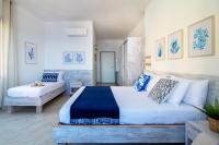 A bed or beds in a room at "Sunset Garden" apartment