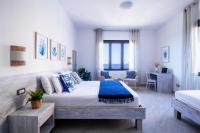 A bed or beds in a room at "Sunset Garden" apartment