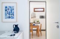 A kitchen or kitchenette at "Sunset Garden" apartment