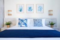 A bed or beds in a room at "Sunset Garden" apartment