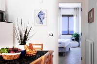 A bed or beds in a room at "Sunset Garden" apartment