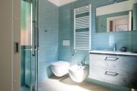 A bathroom at "Sunset Garden" apartment