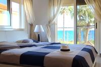 Postel nebo postele na pokoji v ubytování Villa del Mar