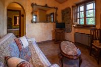 Televízia a/alebo spoločenská miestnosť v ubytovaní Il Colombaio Agriturismo