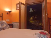 A bed or beds in a room at El Balcon de Peñafiel