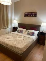 A bed or beds in a room at B&B Maggiore 58