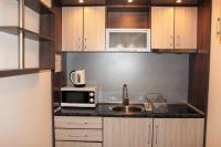 Kuchyň nebo kuchyňský kout v ubytování Borovets Gardens Apartments