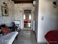 Postel nebo postele na pokoji v ubytování Petrounis Hotel