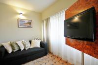 Televízia a/alebo spoločenská miestnosť v ubytovaní 209 w ROYAL TULIP SAND przy plaży DOBRUK APARTAMENTY