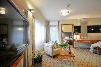 Televízia a/alebo spoločenská miestnosť v ubytovaní 209 w ROYAL TULIP SAND przy plaży DOBRUK APARTAMENTY