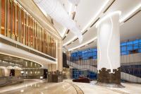 una vista del vestíbulo de un edificio en Luzhou Jianguo Hotel, en Luzhou