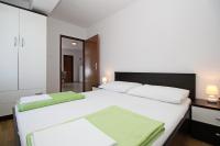 Posteľ alebo postele v izbe v ubytovaní Apartments Mohar II