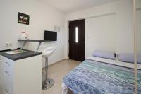 Posteľ alebo postele v izbe v ubytovaní Apartments Mohar II