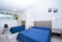 Łóżko lub łóżka w pokoju w obiekcie Ciccio Hotel