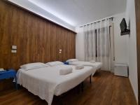 Posteľ alebo postele v izbe v ubytovaní Borghetto Hotel