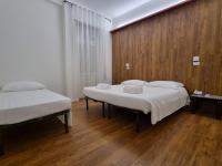 Posteľ alebo postele v izbe v ubytovaní Borghetto Hotel
