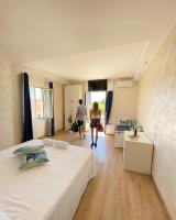 Posteľ alebo postele v izbe v ubytovaní Borghetto Hotel