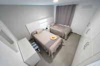 Posteľ alebo postele v izbe v ubytovaní Apartamentos Los Papagayos