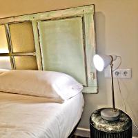 Posteľ alebo postele v izbe v ubytovaní Urban Suites El Postigo