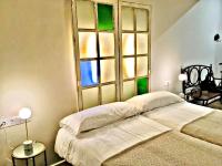 Posteľ alebo postele v izbe v ubytovaní Urban Suites El Postigo