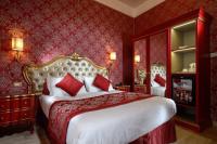 Posteľ alebo postele v izbe v ubytovaní Hotel Canaletto