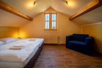 Postel nebo postele na pokoji v ubytování Valnovka Wellness Hotel