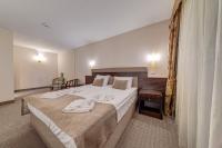 Hotel Bansko SPA & Holidays - Free Parkingにあるベッド