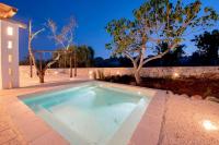The swimming pool at or close to Trullo Lillo