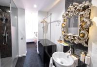 Łazienka w obiekcie Posada del Dragón Boutique Hotel