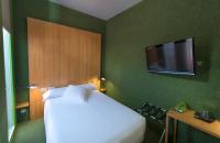 Telewizja i/lub zestaw kina domowego w obiekcie Posada del Dragón Boutique Hotel