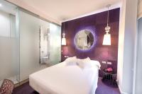 Łóżko lub łóżka w pokoju w obiekcie Posada del Dragón Boutique Hotel