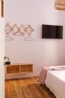 A television and/or entertainment centre at Mapango Small Rooms