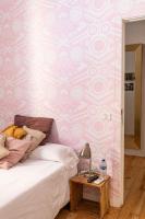 A bed or beds in a room at Mapango Small Rooms