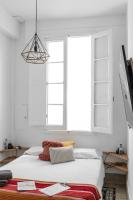 A bed or beds in a room at Mapango Small Rooms