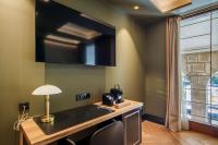 TV a/nebo společenská místnost v ubytování IBIZA ROOMs