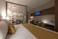 Microtel Inn & Suites by Wyndham Guadalajara Surにあるベッド