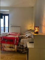 Łóżko lub łóżka w pokoju w obiekcie Residence Cavallino Bianco