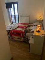 Łóżko lub łóżka w pokoju w obiekcie Residence Cavallino Bianco