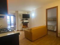 Telewizja i/lub zestaw kina domowego w obiekcie Residence Cavallino Bianco
