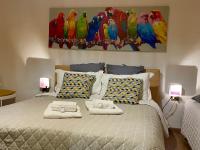 A bed or beds in a room at B&B Maggiore 58
