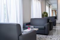 Część wypoczynkowa w obiekcie Hotel La Pergola