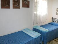 A bed or beds in a room at Apartment Sulla Scogliera by Interhome