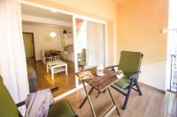 A seating area at Sea & Wave Don Cristian Apartment
