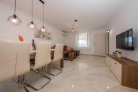 Televízia a/alebo spoločenská miestnosť v ubytovaní Apartment in Kampor/Insel Rab 26301